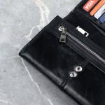 Zdjęcie produktu Skórzany portfel damski ze srebrnym monogramem